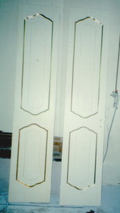 porte con finiture foglia oro